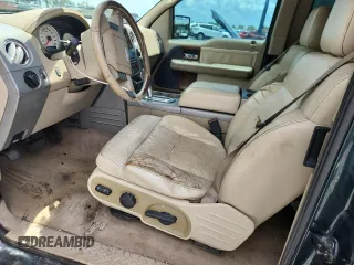 2004 Ford F-150 XL with VIN 1FTPX12564NA87792, listed as a Copart auction lot 60489655 with 396,269 mi miles and Salvage title. Bid and sale history available at DreamBid. Image 7.