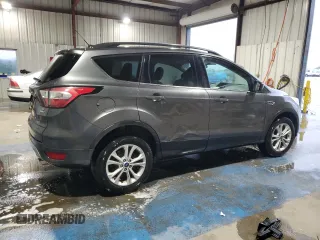 2018 Ford Escape SE with VIN 1FMCU9G90JUB48553, listed as a Copart auction lot 51171255 with 134,423 mi miles and Salvage Title. Bid and sale history available at carsss.com. Image 3.