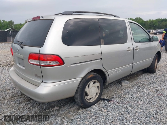 2002 Toyota Sienna LE with VIN 4T3ZF13C92U434076, listed as a IAAI auction lot 42132585 with 243,661 mi miles and . Bid and sale history available at DreamBid. Image 4.