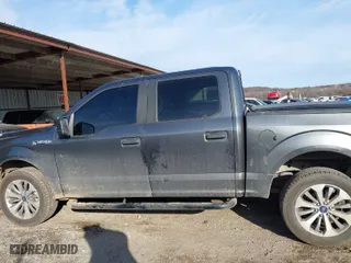 2018 Ford F-150 XL with VIN 1FTEW1EP2JFB56443, listed as a IAAI auction lot 41064561 with 105,215 mi miles. Bid and sale history available at carsss.com. Image 14.