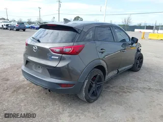 2016 Mazda CX-3 Sport with VIN JM1DKBB75G0114507, listed as a IAAI auction lot 41858416 with 152,822 mi miles. Bid and sale history available at carsss.com. Image 4.