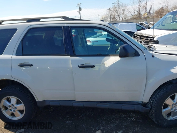 2011 Ford Escape XLT with VIN 1FMCU0D77BKB45161, listed as a IAAI auction lot 41890058 with 263,786 mi miles. Bid and sale history available at carsss.com. Image 14.