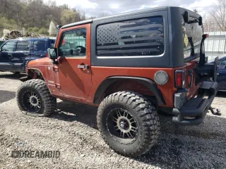 2014 Jeep Wrangler Sport with VIN 1C4AJWAG0EL184815, listed as a Copart auction lot 50307365 with 139,921 mi miles and Salvage title. Bid and sale history available at DreamBid. Image 2.