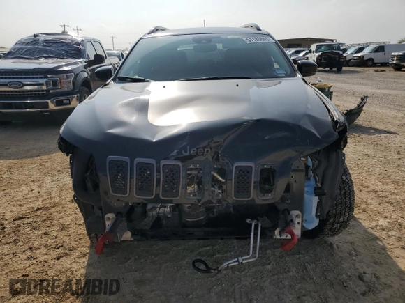 2022 Jeep Cherokee Trailhawk с VIN 1C4PJMBX8ND502686, выставлен на аукционе Copart как лот 51180645 с пробегом 62 865 миль миль и Списание • Salvage title. История ставок и продаж доступна на DreamBid. Изображение 5.