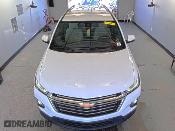 2022 Chevrolet Traverse LT Cloth z VIN 1GNERGKW0NJ133033, wystawiony jako IAAI lot #42843495 z przebiegiem 97 178 mil mil oraz . Historia ofert i sprzedaży dostępna na DreamBid. Obrazek 29.