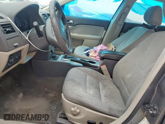 2012 Ford Fusion SE z VIN 3FAHP0HAXCR436084, wystawiony jako Copart lot #57390385 z przebiegiem 88 645 mil mil oraz Szkoda całkowita • Salvage title. Historia ofert i sprzedaży dostępna na DreamBid. Obrazek 7.