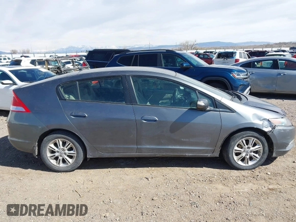 2011 Honda Insight EX with VIN JHMZE2H77BS006244, listed as a IAAI auction lot 41774240 with Not Provided miles and . Bid and sale history available at DreamBid. Image 13.
