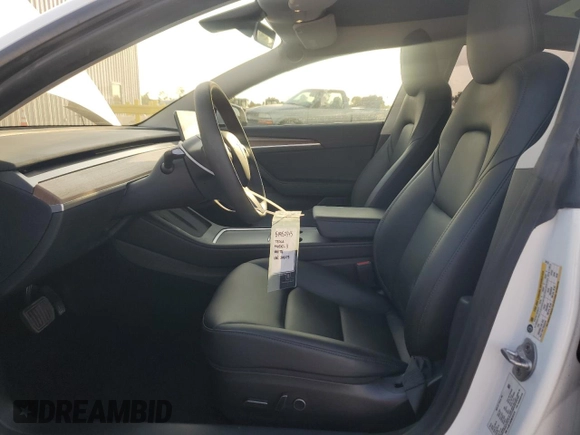 2022 Tesla Model 3 Long Range with VIN 5YJ3E1EB2NF201275, listed as a Copart auction lot 51952345 with 43,540 mi miles and Salvage Title. Bid and sale history available at DreamBid. Image 7.