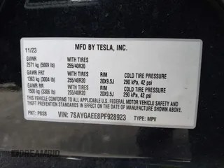 2023 Tesla Model Y Long Range with VIN 7SAYGAEE8PF928923, listed as a IAAI auction lot 41880988 with 18,468 mi miles. Bid and sale history available at carsss.com. Image 9.