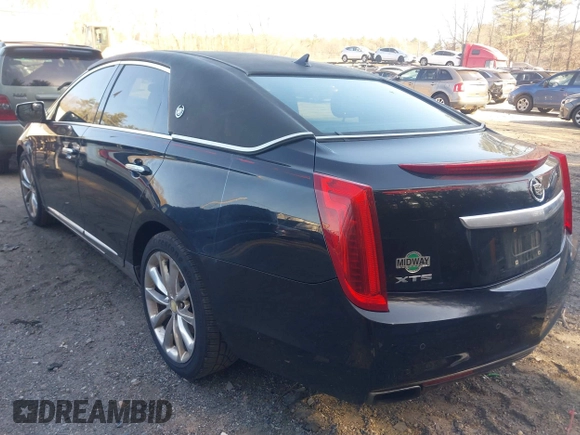 2013 Cadillac XTS Premium z VIN 2G61S5S38D9199459, wystawiony jako IAAI lot #41787638 z przebiegiem 171 298 mil mil oraz . Historia ofert i sprzedaży dostępna na DreamBid. Obrazek 3.