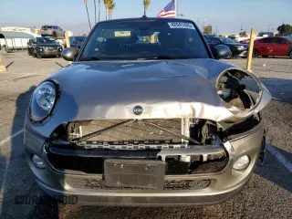 2019 MINI Convertible Cooper с VIN WMWWG5C5XK3F79624, выставлен на аукционе Copart как лот 42047405 с пробегом 52 977 миль миль и Списание • Salvage title. История ставок и продаж доступна на DreamBid. Изображение 5.