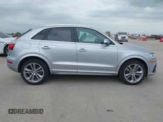 2018 Audi Q3 Premium Plus z VIN WA1JCCFS8JR023281, wystawiony jako IAAI lot #42071289 z przebiegiem 71 335 mil mil oraz . Historia ofert i sprzedaży dostępna na DreamBid. Obrazek 14.