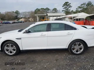 2016 Ford Taurus SE z VIN 1FAHP2D83GG131408, wystawiony jako IAAI lot #41552981 z przebiegiem 151 295 mil mil oraz . Historia ofert i sprzedaży dostępna na DreamBid. Obrazek 15.