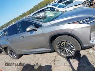 2020 Lexus RX with VIN JTJJGKFA7L2013877, listed as a IAAI auction lot 40678497 with 67,271 mi miles. Bid and sale history available at carsss.com. Image 13.