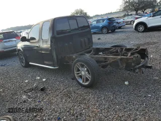 2000 Ford F-150 XL with VIN 2FTRX07L1YCA89598, listed as a Copart auction lot 55571645 with 235,923 mi miles and Salvage title. Bid and sale history available at DreamBid. Image 2.