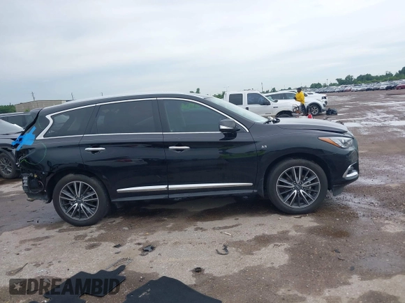 2019 Infiniti QX60 Luxe with VIN 5N1DL0MN8KC507367, listed as a IAAI auction lot 42476877 with 69,810 mi miles and . Bid and sale history available at DreamBid. Image 13.