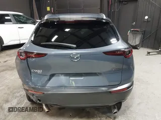 2022 Mazda CX-30 S Carbon Edition with VIN 3MVDMBCL8NM447234, listed as a IAAI auction lot 42511600 with 51,926 mi miles and . Bid and sale history available at DreamBid. Image 16.