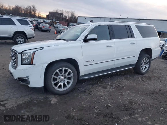 2020 GMC Yukon XL Denali with VIN 1GKS2HKJ1LR299560, listed as a Copart auction lot 84943284 with 99,084 mi miles and Salvage Title. Bid and sale history available at carsss.com. Image 1.