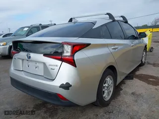2019 Toyota Prius L Eco with VIN JTDKARFUXK3085578, listed as a IAAI auction lot 41073531 with 104,445 mi miles. Bid and sale history available at carsss.com. Image 4.