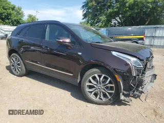 2021 Cadillac XT5 AWD Sport with VIN 1GYKNGRS8MZ152739, listed as a Copart auction lot 60675705 with 51,669 mi miles and Salvage title. Bid and sale history available at DreamBid. Image 4.