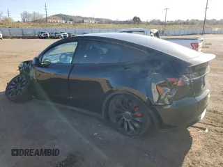 2023 Tesla Model Y Performance with VIN 7SAYGDEF3PF847225, listed as a Copart auction lot 52171135 with 29,724 mi miles and Salvage Title. Bid and sale history available at DreamBid. Image 2.