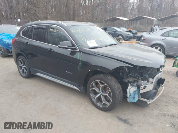 2017 BMW X1 xDrive28i with VIN WBXHT3C31H5F72958, listed as a IAAI auction lot 41782257 with 134,829 mi miles. Bid and sale history available at carsss.com. Image 1.