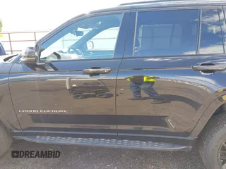 2023 Jeep Grand Cherokee Overland with VIN 1C4RJHDG2PC526889, listed as a IAAI auction lot 42247177 with 71,390 mi miles and . Bid and sale history available at DreamBid. Image 14.