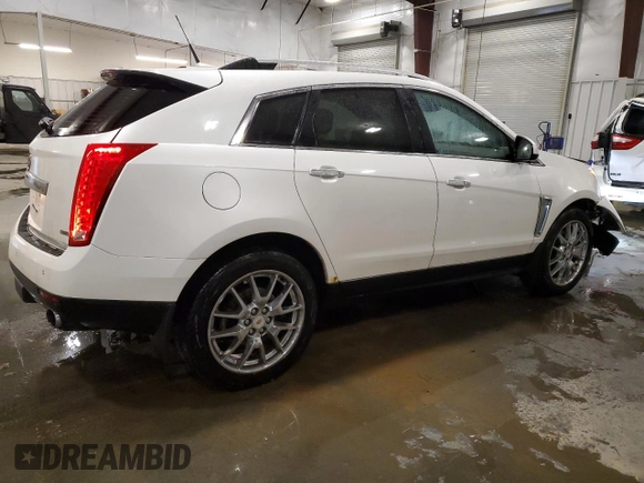2014 Cadillac SRX Premium Collection z VIN 3GYFNGE36ES581361, wystawiony jako Copart lot #88540815 z przebiegiem 137 047 mil mil oraz Nie do naprawy. Historia ofert i sprzedaży dostępna na DreamBid. Obrazek 3.
