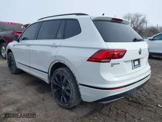 2020 Volkswagen Tiguan SE with VIN 3VV2B7AX4LM106638, listed as a IAAI auction lot 41744503 with 67,693 mi miles. Bid and sale history available at carsss.com. Image 3.