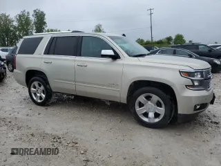 2015 Chevrolet Tahoe LTZ z VIN 1GNSKCKC5FR100084, wystawiony jako Copart lot #57677825 z przebiegiem 141 987 mil mil oraz Czysty tytuł • Clean title. Historia ofert i sprzedaży dostępna na DreamBid. Obrazek 4.