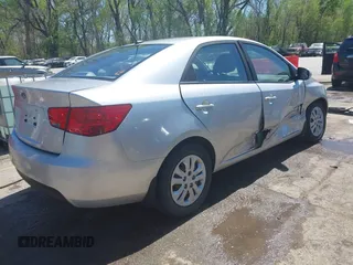 2010 Kia Forte LX with VIN KNAFT4A29A5061695, listed as a IAAI auction lot 42034559 with 114,470 mi miles. Bid and sale history available at carsss.com. Image 4.