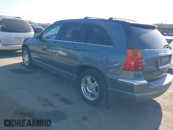 2005 Chrysler Pacifica Touring with VIN 2C4GM68445R651173, listed as a IAAI auction lot 41447054 with 294,074 mi miles and . Bid and sale history available at DreamBid. Image 3.