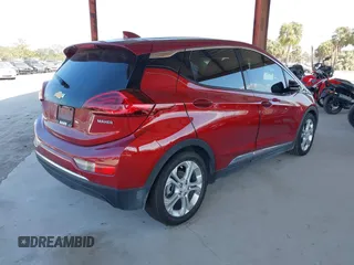 2020 Chevrolet Bolt EV LT z VIN 1G1FY6S01L4136064, wystawiony jako IAAI lot #41566555 z przebiegiem 52 995 mil mil oraz . Historia ofert i sprzedaży dostępna na DreamBid. Obrazek 4.