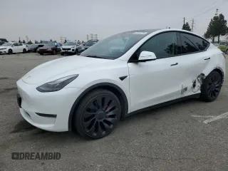 2022 Tesla Model Y Performance z VIN 7SAYGDEF5NF567688, wystawiony jako Copart lot #50432295 z przebiegiem 51 577 mil mil oraz Szkoda całkowita • Salvage title. Historia ofert i sprzedaży dostępna na DreamBid. Obrazek 1.