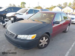 2000 Toyota Camry CE with VIN 4T1BG22K9YU688451, listed as a IAAI auction lot 42066777 with 210,221 mi miles. Bid and sale history available at carsss.com. Image 2.