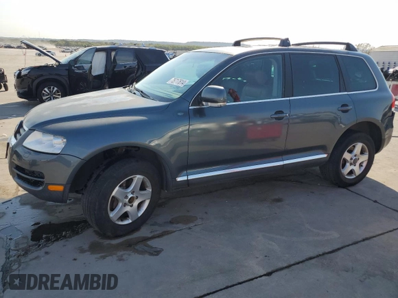 2005 Volkswagen Touareg 4.2L V8 z VIN WVGZM77L55D061960, wystawiony jako Copart lot #75717614 z przebiegiem 188 101 mil mil oraz Szkoda całkowita • Salvage title. Historia ofert i sprzedaży dostępna na DreamBid. Obrazek 1.