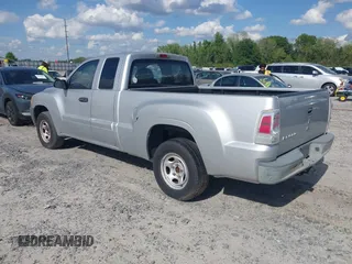 2007 Mitsubishi Raider LS with VIN 1Z7HC22K57S162987, listed as a IAAI auction lot 42015748 with 100,919 mi miles. Bid and sale history available at carsss.com. Image 3.