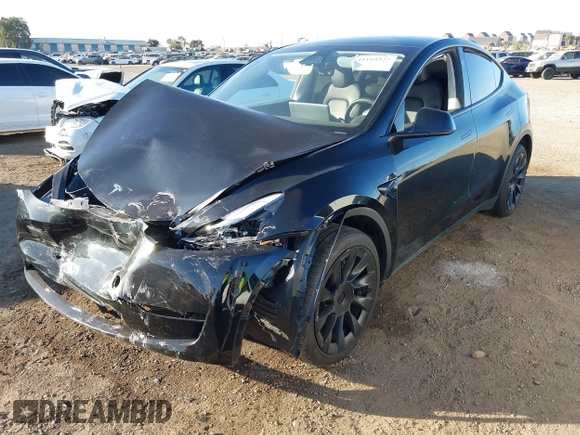 2023 Tesla Model Y Long Range with VIN 7SAYGDEE0PF907260, listed as a IAAI auction lot 41180227 with Not Provided miles and . Bid and sale history available at DreamBid. Image 2.