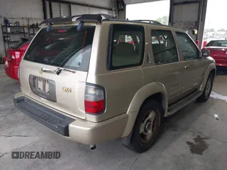 1999 Infiniti QX4 z VIN JNRAR05Y1XW049630, wystawiony jako IAAI lot #42296808 z przebiegiem 247 654 mil mil oraz . Historia ofert i sprzedaży dostępna na DreamBid. Obrazek 4.