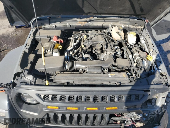 2022 Jeep Gladiator Willys with VIN 1C6HJTAG7NL117102, listed as a Copart auction lot 87679075 with 28,196 mi miles and Salvage title. Bid and sale history available at DreamBid. Image 11.