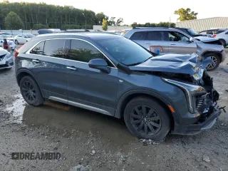 2019 Cadillac XT4 FWD Premium Luxury z VIN 1GYFZCR47KF123621, wystawiony jako Copart lot #69766894 z przebiegiem 68 191 mil mil oraz Szkody całkowita. Historia ofert i sprzedaży dostępna na DreamBid. Obrazek 4.
