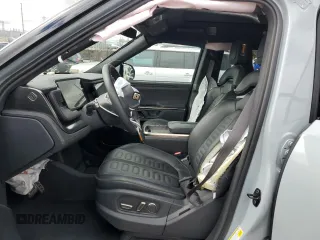 2024 Rivian R1S Adventure with VIN 7PDSGABA7RN038477, listed as a Copart auction lot 48711345 with 0 mi miles and Salvage Title. Bid and sale history available at carsss.com. Image 7.