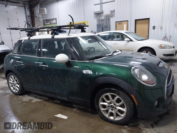 2015 MINI Hardtop 4 Door S z VIN WMWXU3C55FT892293, wystawiony jako IAAI lot #41359066 z przebiegiem 112 704 mil mil oraz . Historia ofert i sprzedaży dostępna na DreamBid. Obrazek 6.