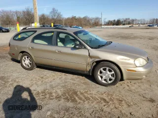2001 Mercury Sable LS Premium with VIN 1MEHM59S71G644207, listed as a Copart auction lot 84601144 with 71,236 mi miles and Salvage Title. Bid and sale history available at DreamBid. Image 4.