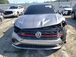 2020 Volkswagen Jetta GLI S z VIN 3VW5T7BUXLM010832, wystawiony jako Copart lot #66376523 z przebiegiem 66 434 mil mil oraz . Historia ofert i sprzedaży dostępna na DreamBid. Obrazek 5.