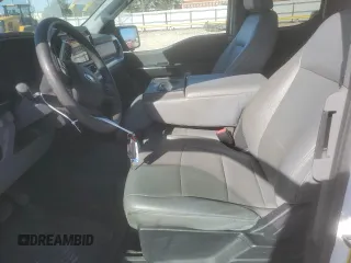 2021 Ford F-150 XL with VIN 1FTEX1C59MFD09404, listed as a Copart auction lot 87176314 with 93,801 mi miles and Salvage title. Bid and sale history available at DreamBid. Image 7.