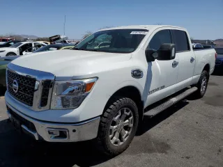 2017 Nissan Titan SL z VIN 1N6BA1F28HN559036, wystawiony jako Copart lot #51975015 z przebiegiem 99 582 mil mil oraz Szkoda całkowita • Salvage title. Historia ofert i sprzedaży dostępna na DreamBid. Obrazek 1.