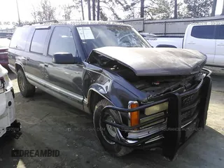 1993 GMC Suburban with VIN 1GKEC16K9PJ754213, listed as a IAAI auction lot 22062516 with 212,780 mi miles. Bid and sale history available at carsss.com. Image 1.