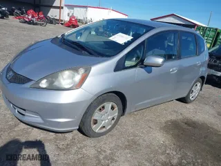 2013 Honda Fit with VIN JHMGE8H35DC073946, listed as a IAAI auction lot 41834130 with 173,018 mi miles. Bid and sale history available at carsss.com. Image 2.