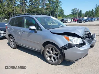 2016 Subaru Forester Touring z VIN JF2SJAXC4GH564016, wystawiony jako IAAI lot #42408444 z przebiegiem 34 506 mil mil oraz . Historia ofert i sprzedaży dostępna na DreamBid. Obrazek 1.